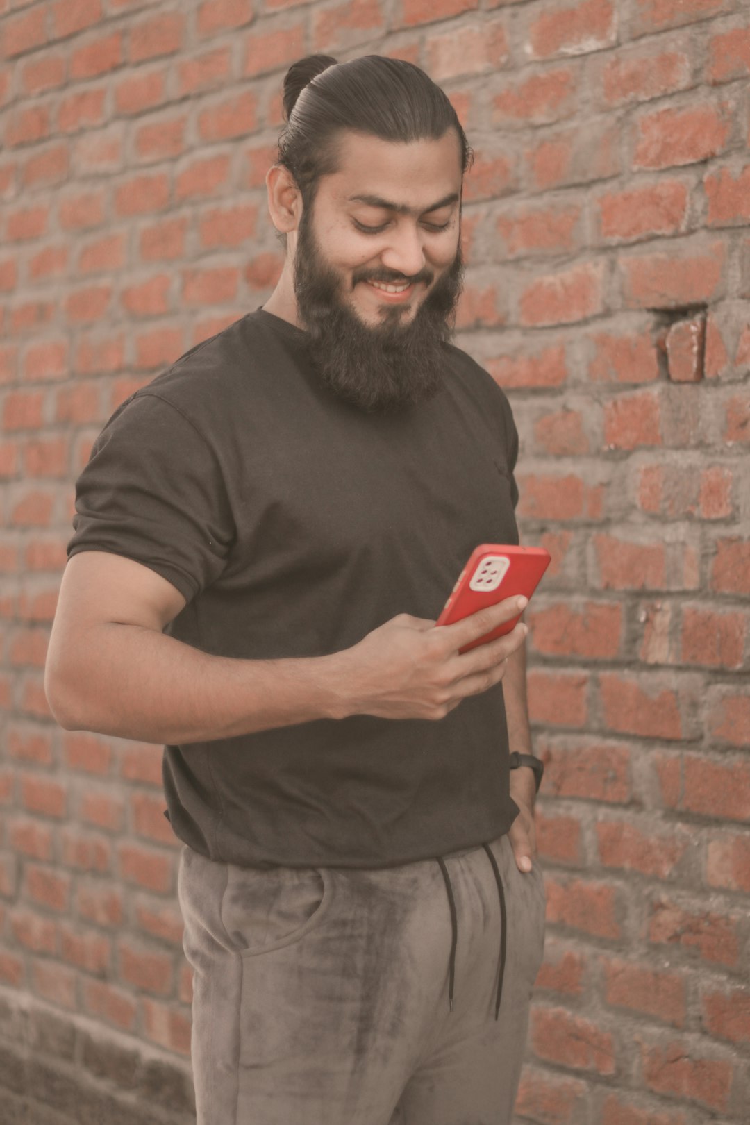 a man holding a red box