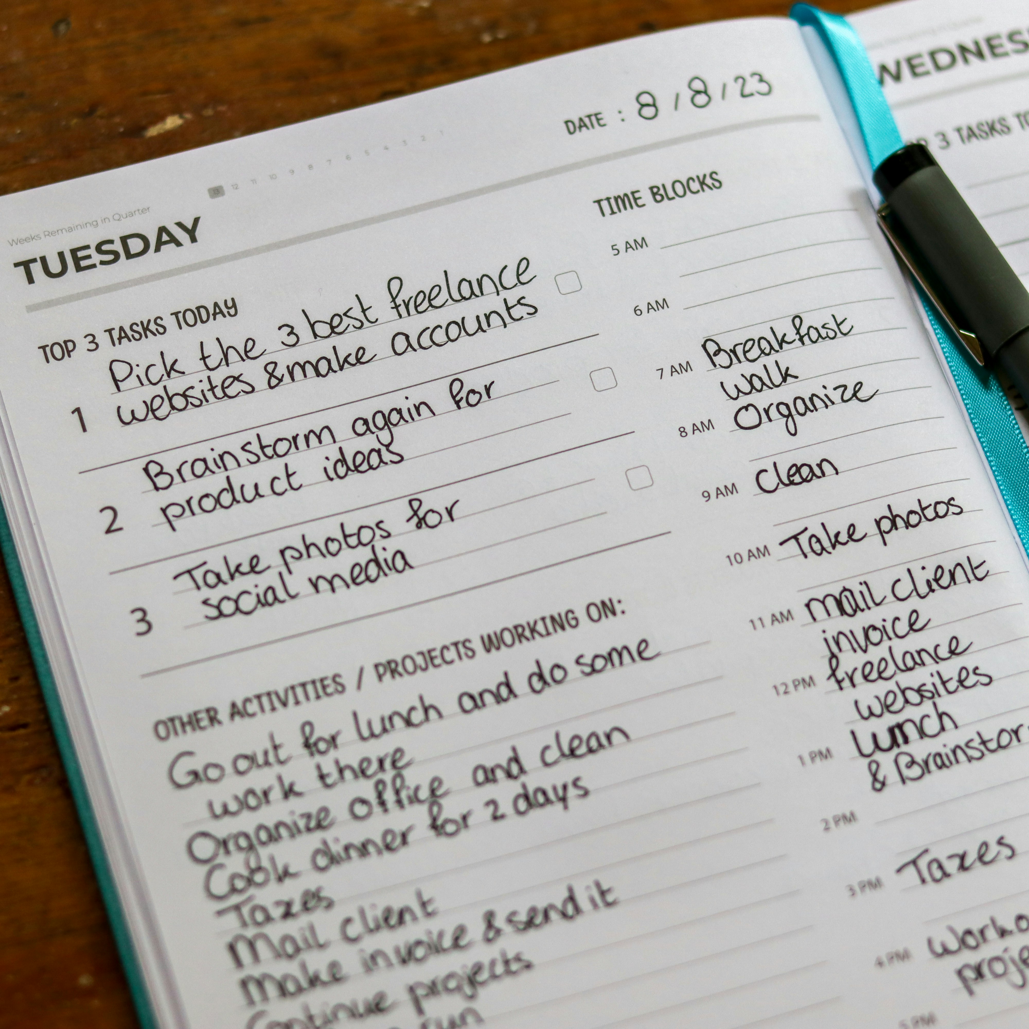 Writing down activities you want to achieve by Daily Checklist a recipe book with a pen on top of it